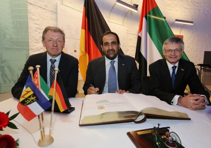 Oberbürgermeister Dr. Peter Kurz, Dr. Rashid Ahmad Bin Fahad und Dr. Müller